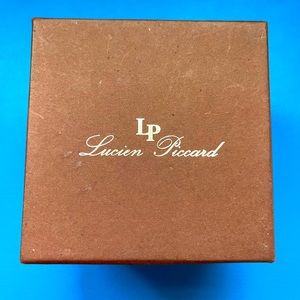 LP (Lucien Picard) Designer Watch Gold with white strap.